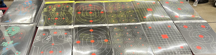Hundreds of 12x18 splatter target packs laid out on a table