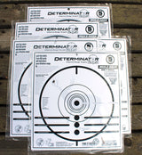 Determinator Mule Deer Obsession: five sealed target packs stacked on a wooden table — image 1