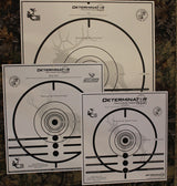 Determinator Rocky Mountain package: three targets laid out on dark wood — image 2