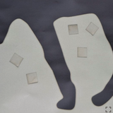 IR Tools 25M pasters patching holes on gray silhouette targets