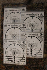 Determinator Whitetail Deer Obsession: five target packs fanned out on a wooden table — image 1