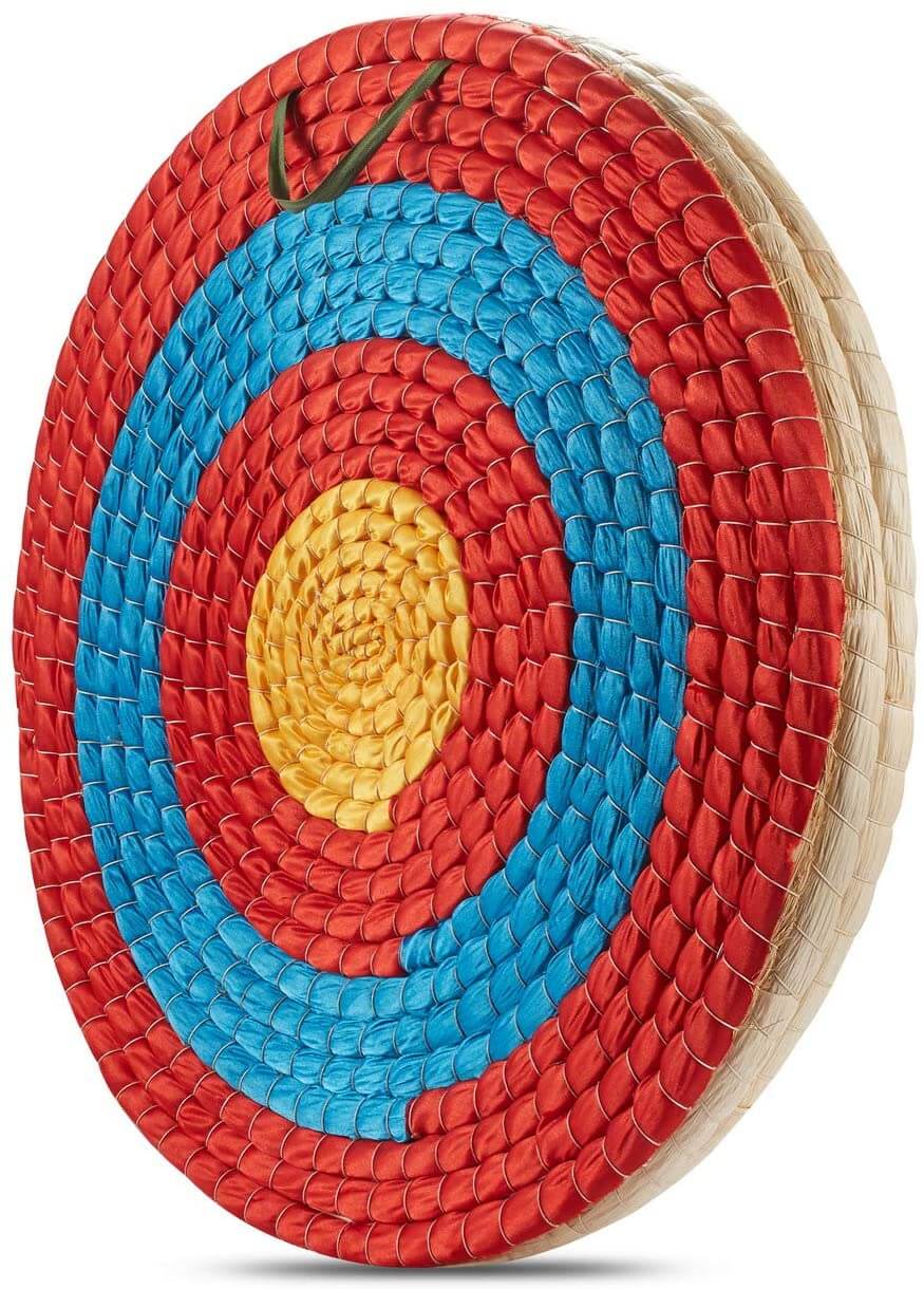 Traditional hand-made straw archery target with red, blue and gold rings, angled view