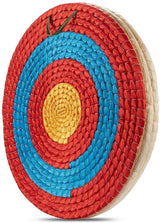 Traditional hand-made straw archery target with red, blue and gold rings, angled view — image 1